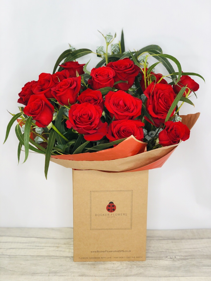 <h2>Valentines Day Eighteen Red Roses</h2>
<br>
<ul>
<li>Approximate Dimensions 50x40cm</li>
<li>18 romantic red roses hand-arranged and gift wrapped in our signature eco-friendly packaging and finished off with a hidden wooden ladybird</li>
<li>Our flowers are backed by our 7 days freshness guarantee</li>
<li>For delivery area coverage see below</li>
<li>Click and Collection available from Booker Avenue, L18 but MUST be pre-ordered</li>
</ul>
<br>
<h2>Flower Delivery Coverage</h2>
<p>Our shop delivers flowers to the following Liverpool postcodes L1 L2 L3 L4 L5 L6 L7 L8 L11 L12 L13 L14 L15 L16 L17 L18 L19 L24 L25 L26 L27 L36 L70 If you order is for an area outside of these we can organise delivery for you through our network of florists.</p>
<br>
<h2>Valentines Flowers - Handtied Bouquet</h2>
<p>This large bouquet of 18 red large-headed roses is a popular choice for Valentines Day to let someone know you are thinking of them. These roses have an amazing scent and make a beautiful handtied bouquet for someone special.</p>
<p>We have a gorgeous selection of Valentines flowers and this choice will not disappoint. Red Roses are always popular and there is no exception for Valentines Day.</p>
<p>All our bouquets have a small wooden ladybird hidden amongst them, so do not forget to spot the ladybird and post a picture on our social media pages to enter our rolling competition.</p>
<p>Featuring 18 red large-headed roses hand-arranged with mixed foliage and presented in eco-friendly gift wrapping and presentation box.</p>
<br>
<h2>Eco-Friendly Liverpool Florists</h2>
<p>As florists we feel very close earth and want to protect it. Plastic waste is a huge problem in the florist industry so we made the decision to make our packaging eco-friendly.</p>
<p>To achieve this we worked with our packaging supplier to remove the lamination off our boxes and wrap the tops in an Eco Flowerwrap which means it easily compostable or can be fully recycled.</p>
<p>Once you have finished enjoying your flowers from us they will go back into growing more flowers! Only a small amount of plastic is used as a water bubble and this is biodegradable.</p>
<p>Even the sachet of flower food included with your bouquet is compostable.</p>
<p>All our bouquets have small wooden ladybird hidden amongst them so do not forget to spot the ladybird and post a picture on our social media pages to enter our rolling competition.</p>
<br>
<h2>Flowers Guaranteed for 7 Days</h2>
<p>Our 7-day freshness guarantee should give you confidence that we will only send out good quality flowers.</p>
<p>Leave it in our hands we will create a marvellous bouquet which will not only look good on arrival but will continue to delight as the flowers bloom.</p>
<br>
<h2>Liverpool Flower Delivery</h2>
<p>We are open 7 days a week and offer advanced booking flower delivery and same-day flower delivery. Guaranteed AM Flower Delivery and also offer Sunday Flower Delivery.</p>
<p>Our florists deliver in Liverpool and can provide flowers for you in Liverpool Merseyside. And through our network of florists can organise flower deliveries for you nationwide.</p>
<br>
<h2>The Best Florist in Liverpool your local Liverpool Flower Shop</h2>
<p>Come to Booker Flowers and Gifts Liverpool for your beautiful flowers and plants. For that bit of extra luxury we also offer a lovely range of finishing touches such as wines champagne locally crafted Gin and Rum Vases Scented Candles and Chocolates that can be delivered with your flowers.</p>
<p>To see the full range see our extras section.</p>
<p>You can trust Booker Flowers and Gifts to deliver the very best for you.</p>
<br>
<p><em>Google Review by Ben Capper</em></p>
<p><em>Booker Florists are the best! So friendly and helpful, their flowers are always seasonal and top quality. Highly recommended.</em></p>
<br>